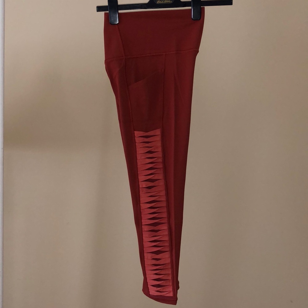 Athleta Salutation 7/8 Tight in Powervita  - size Medium.  rust with salmon trim